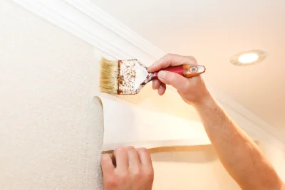 Pose de papier peint à Sionne — revêtements muraux et toiles de verre